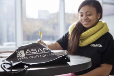 Female student sitting at a desk