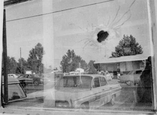 The hole in upper right of picture was made by a 30-30 caliber bullet which mortally wounded Medgar Evers, state field secretary for the National Association for the Advancement of Colored People in Jackson, Miss., on June 12, 1963. A bullet passed through Evers into the window, which reflects the car where Evers was when he was shot in the back. (AP Photo)