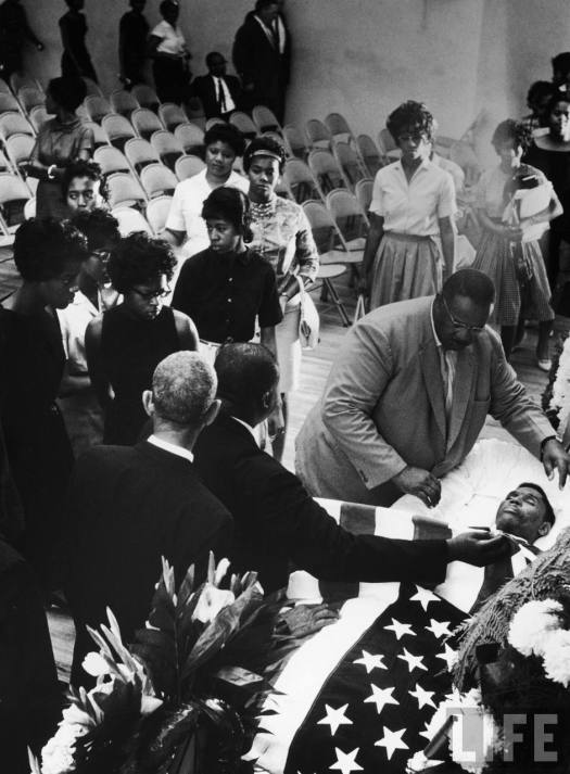 Mourners saying farewell to slain NAACP official Medgar Evers at his funeral.