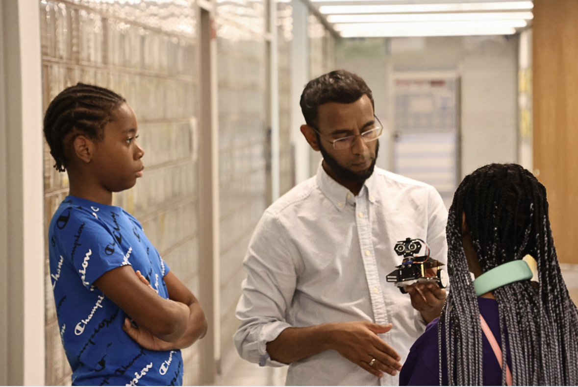 Robotics instructor Padma Paramananda provided instructions for student-scholars to build, code and test robots called Brainy Bots. Students participated in teams in a highly motivated Brainy Bot coding battle as a final activity