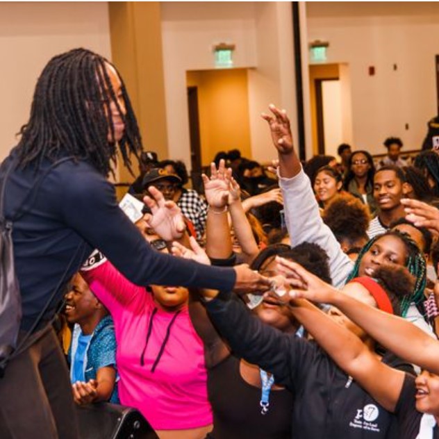 Dr. Theresa Price interacting with students at a recent Black College Expo