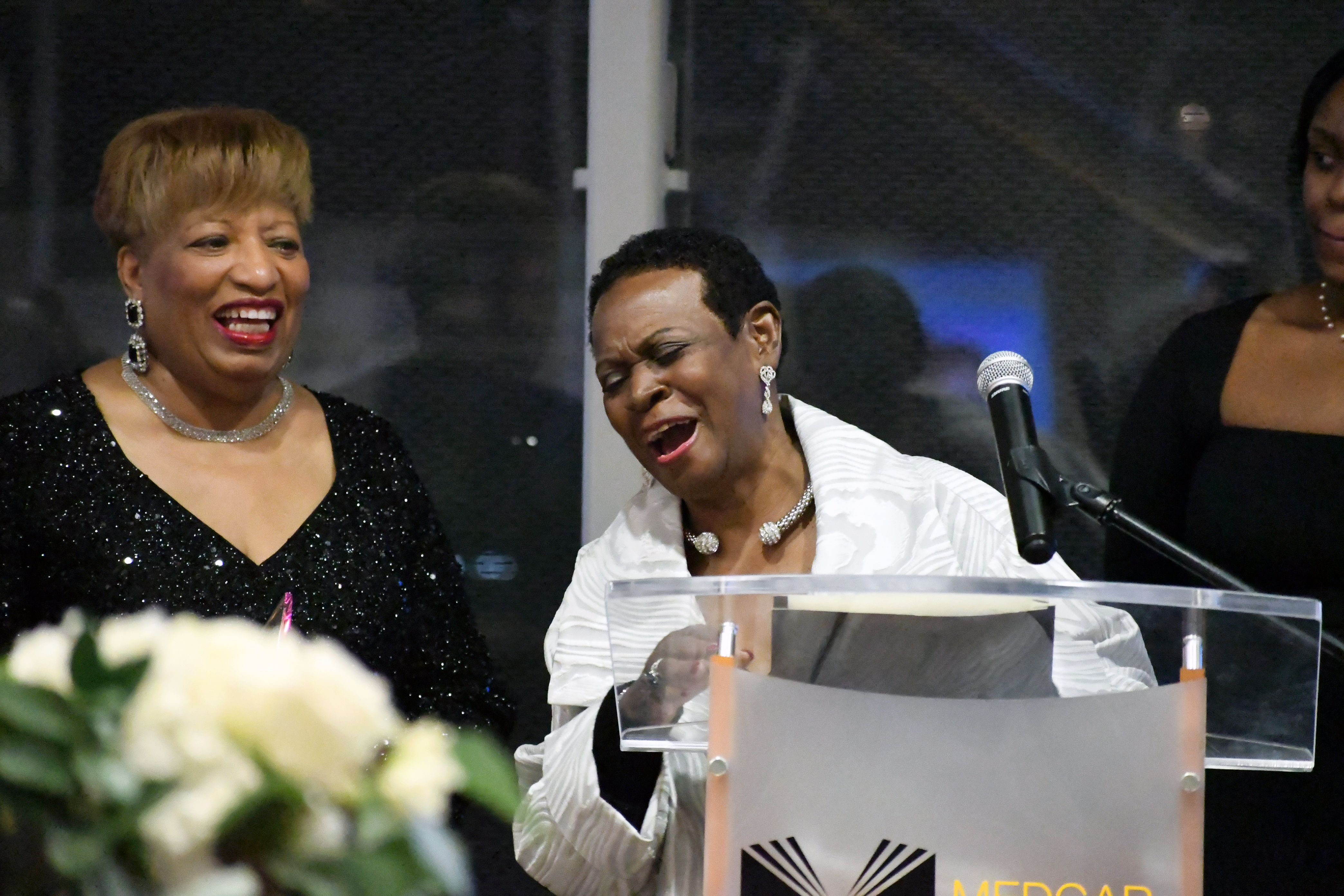 The Honorable Annette Robinson sharing a laugh with Medgar Evers College President, Dr. Patricia Ramsey