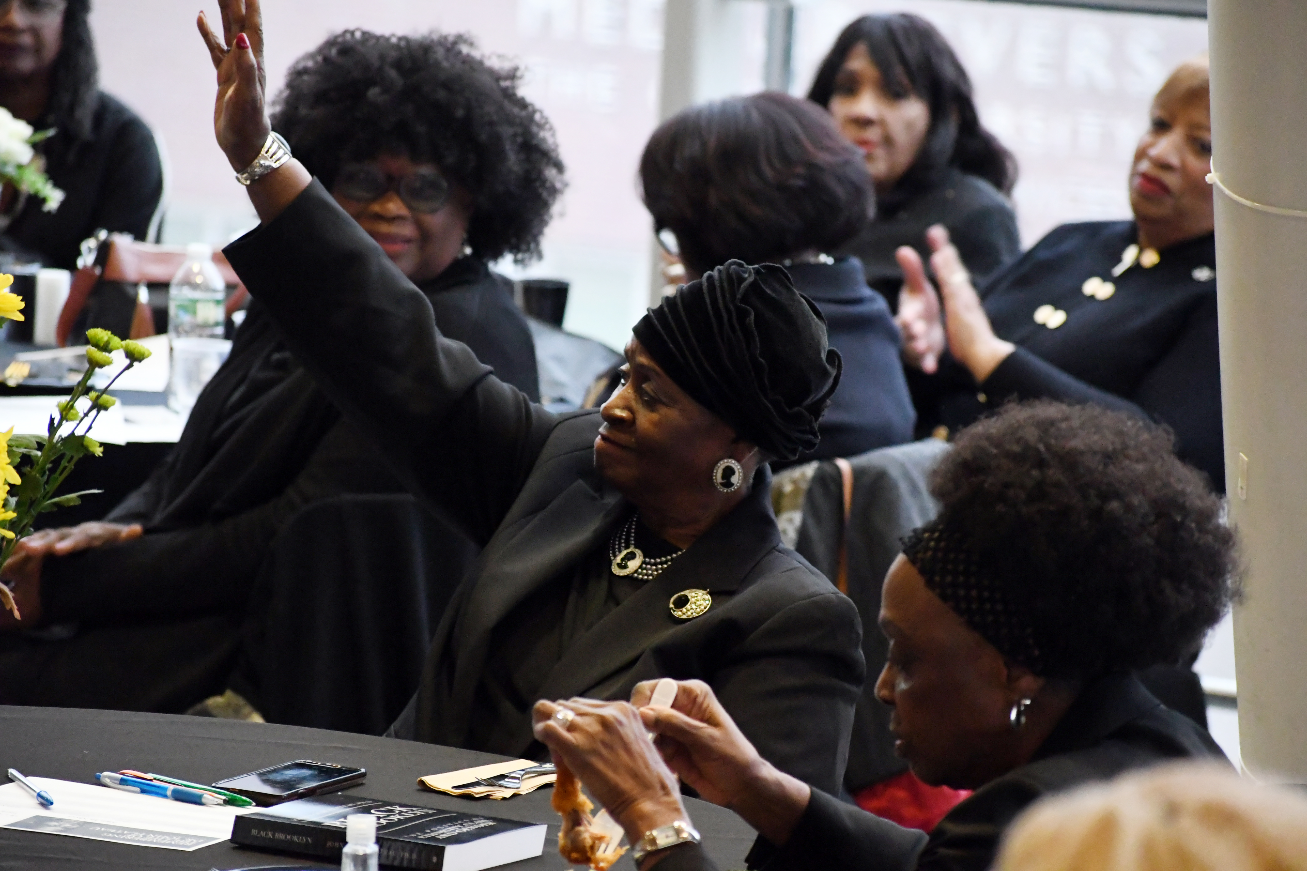 The Honorable Dr. Annette M. Robinson acknowledges the room at the repast honoring Dr. Flateau, held at Medgar Evers College on January 10, 2024.