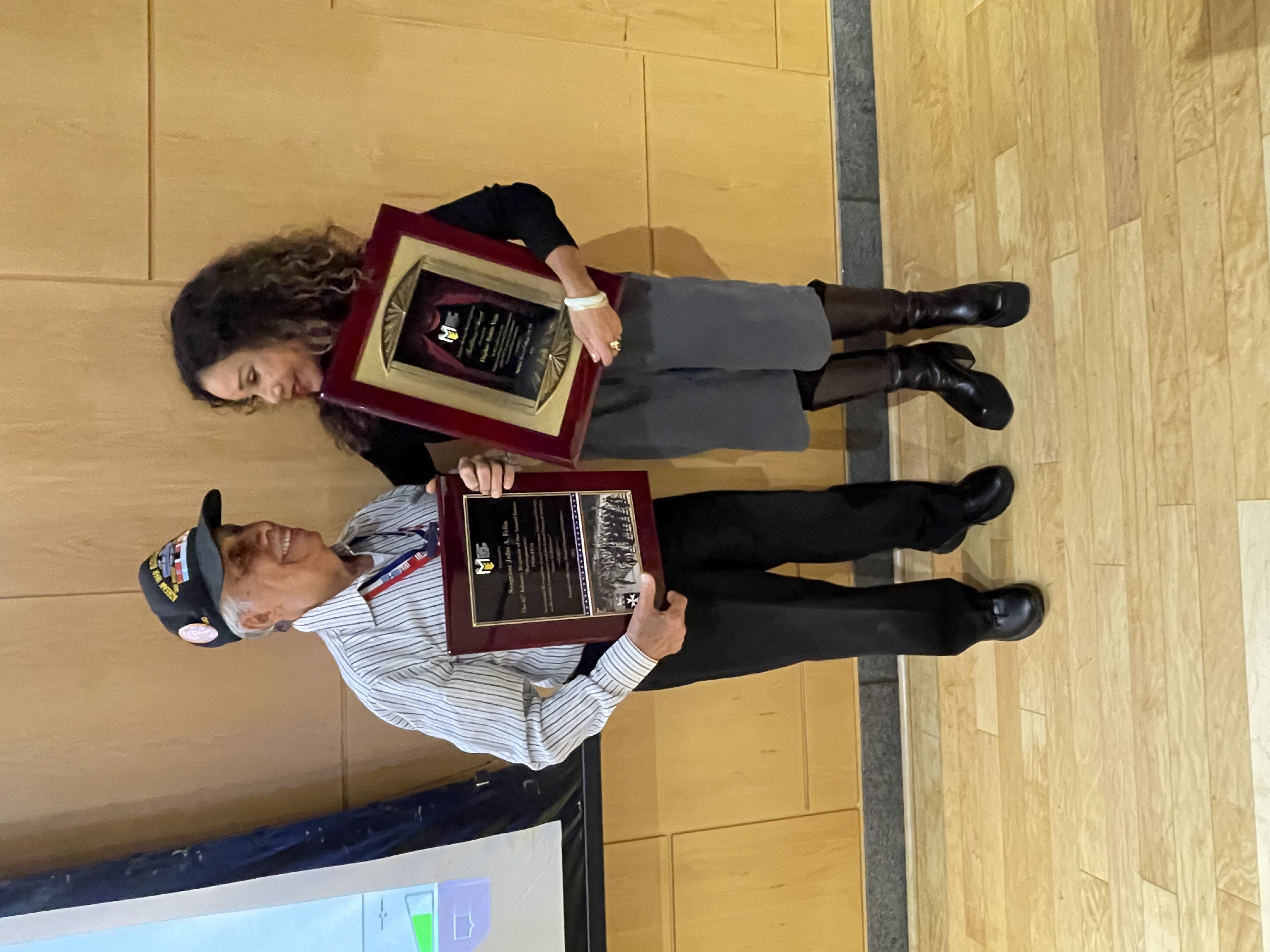 From left: Honorees Sgt. Julio A. Feliu and Daphne Rubin-Vega share a moment