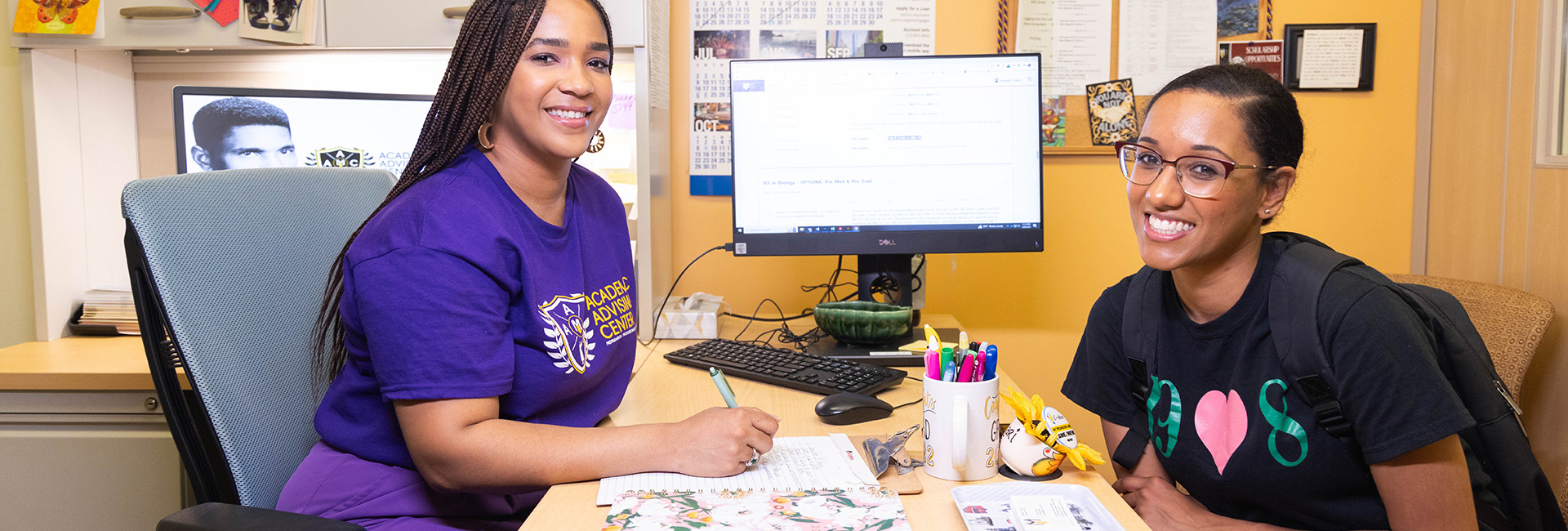 Female advisor with female student