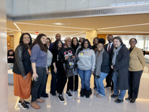 Group photo with Joy Reid, Provost Antoinette Coleman, SVP Kane and others