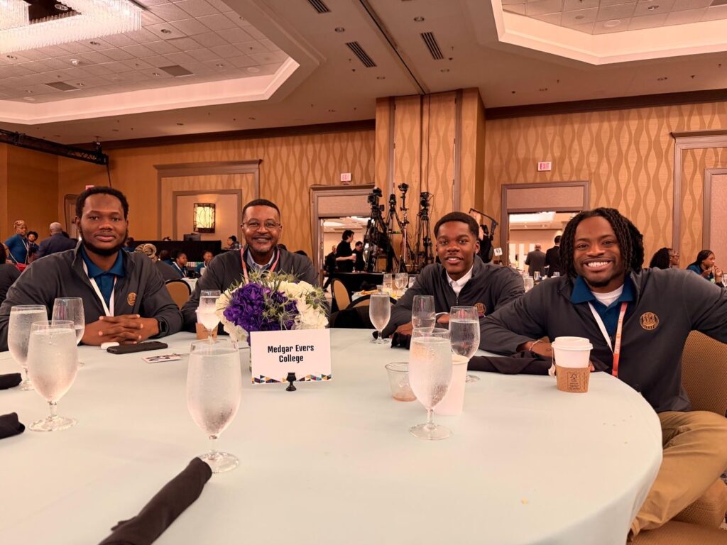 Attendees at the Saturday morning breakfast. From left: Thierno Diallo, Dr. Jesse Kane, Tariq Shallow, Ibraheem Keita.