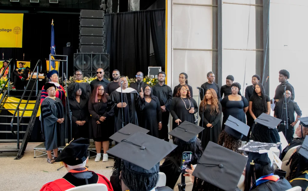 Dr. Glenn McMillan directing the Medgar Evers College Singers and Alumni
